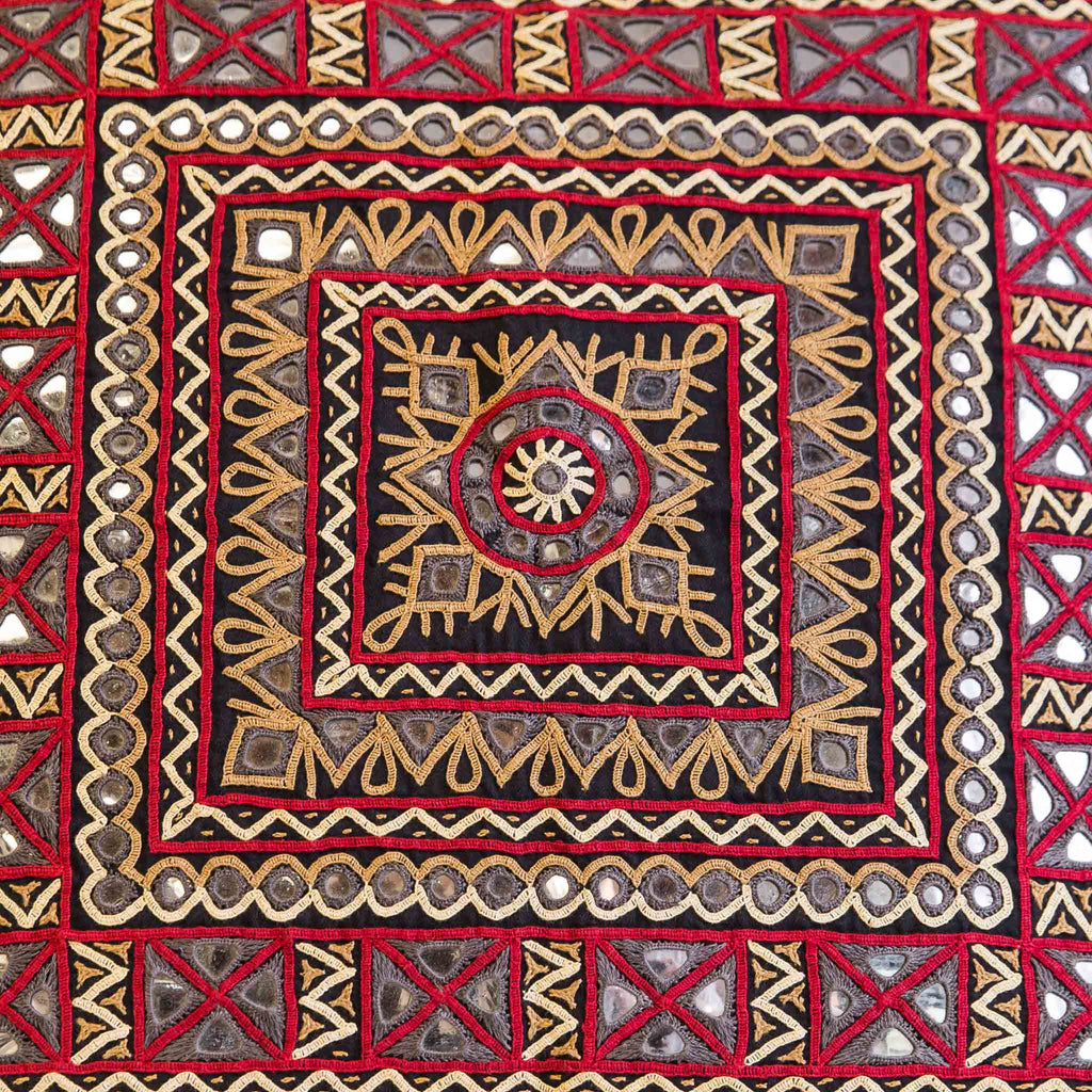 Rabari 24" gold and brown Embroidered motif on black linen cushion cover from kachchh with Maiwa